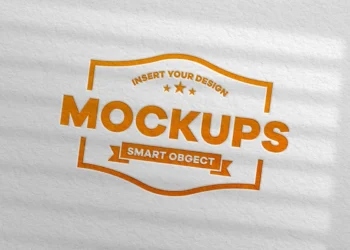 Realistic embossed logo mockup on white textured paper with natural shadows, high-quality PSD template.